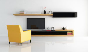 yellow armchair in a minimalist living room with flat tv